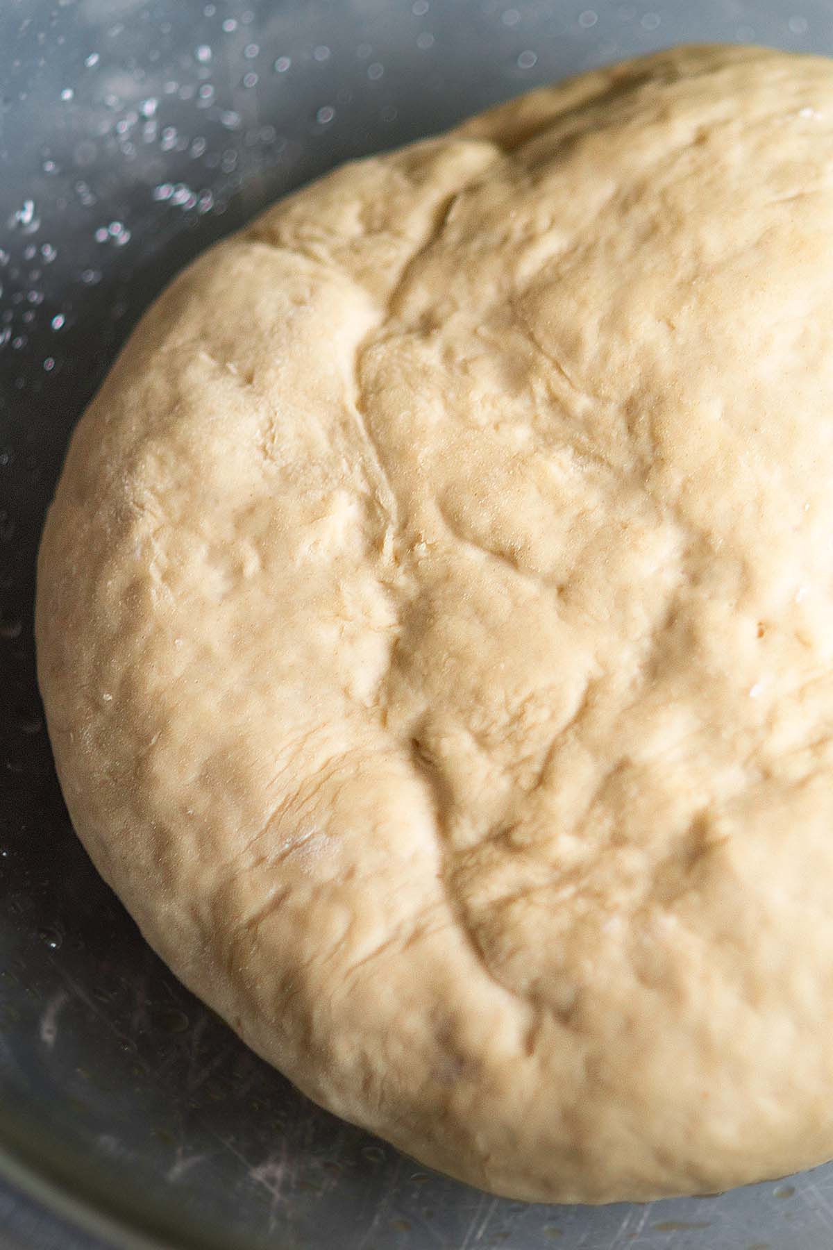 White bread dough kneaded and shaped.