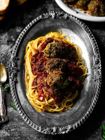 Spaghetti and meatballs served with a thick Italian meat sauce.