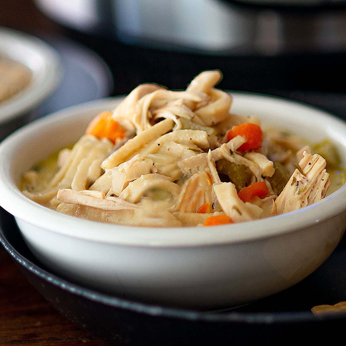 https://chickenfriedkitchen.com/wp-content/uploads/2022/01/Homestyle-chicken-noodle-soup-Feature.jpg