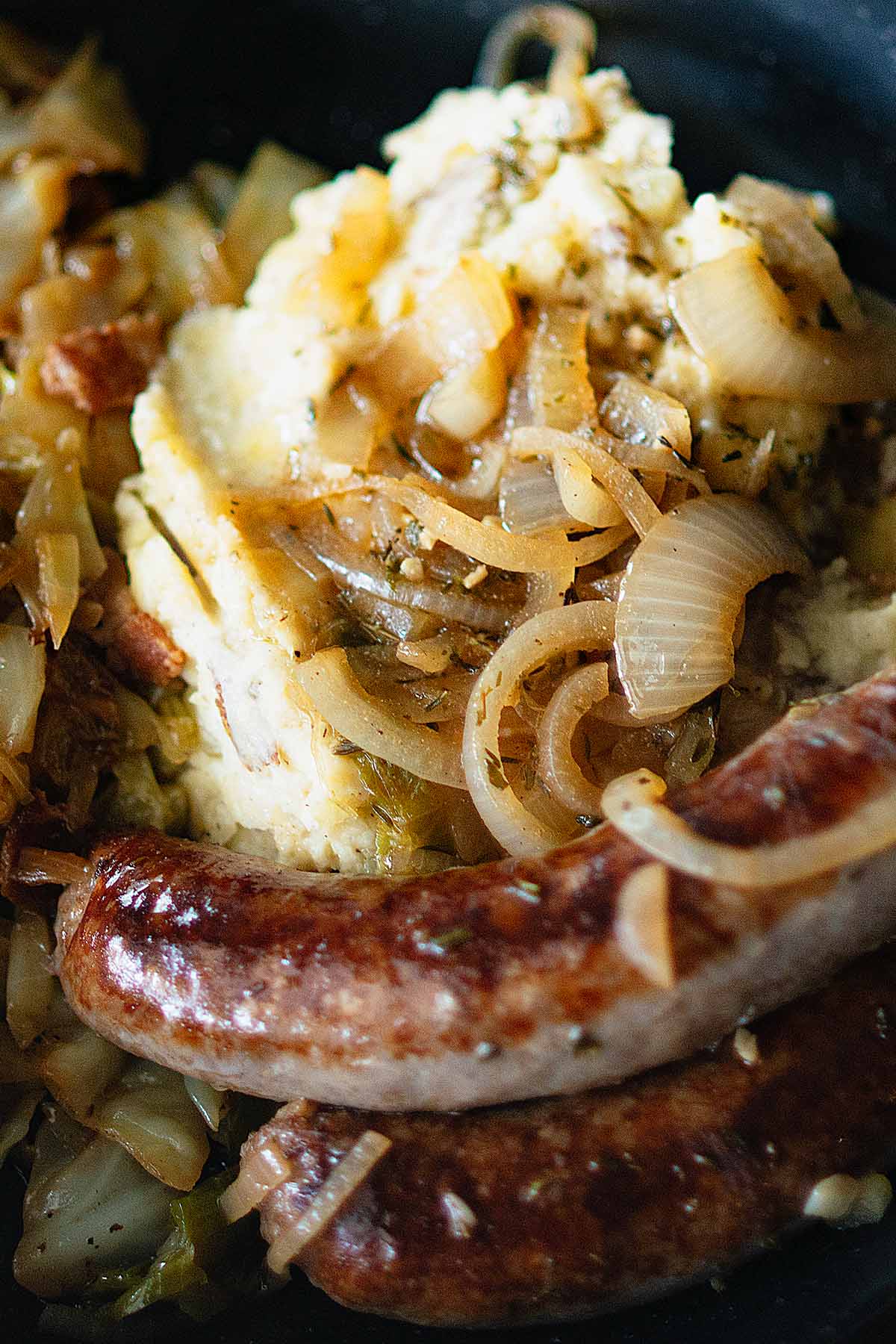Bangers and mash with beer braised onions. 