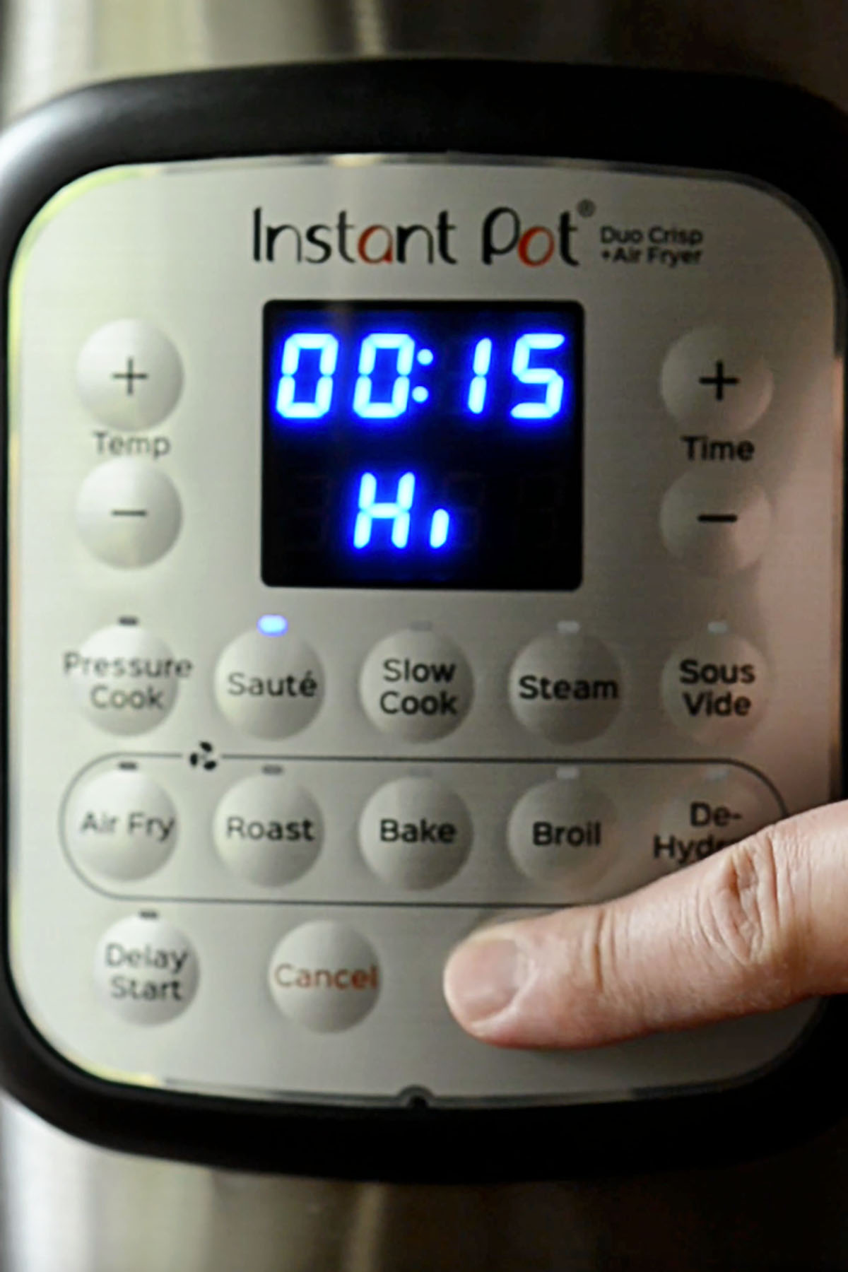 Instant Pot being set to sauté on high for 15 minutes.