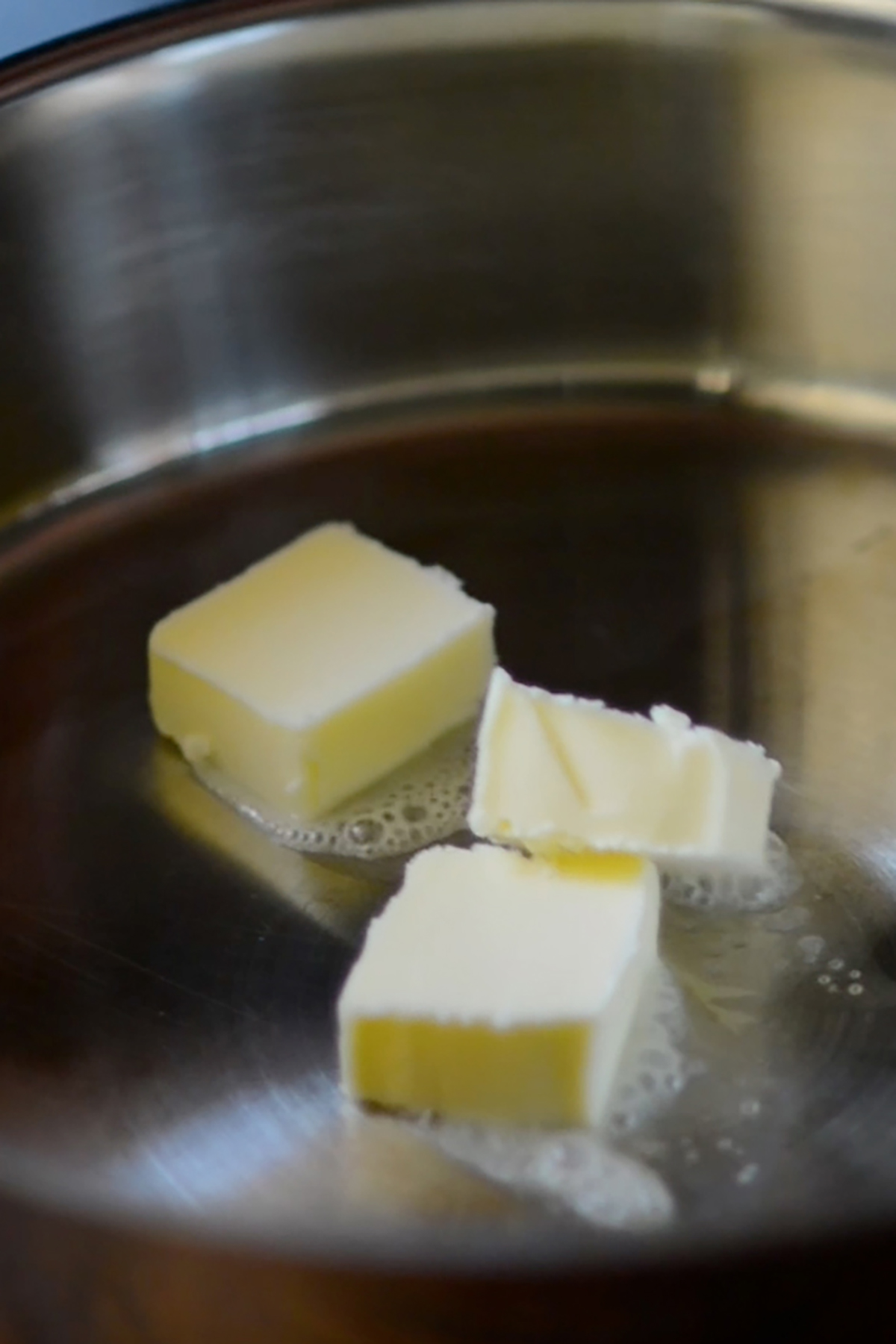 Butter melting in a sauce pan.