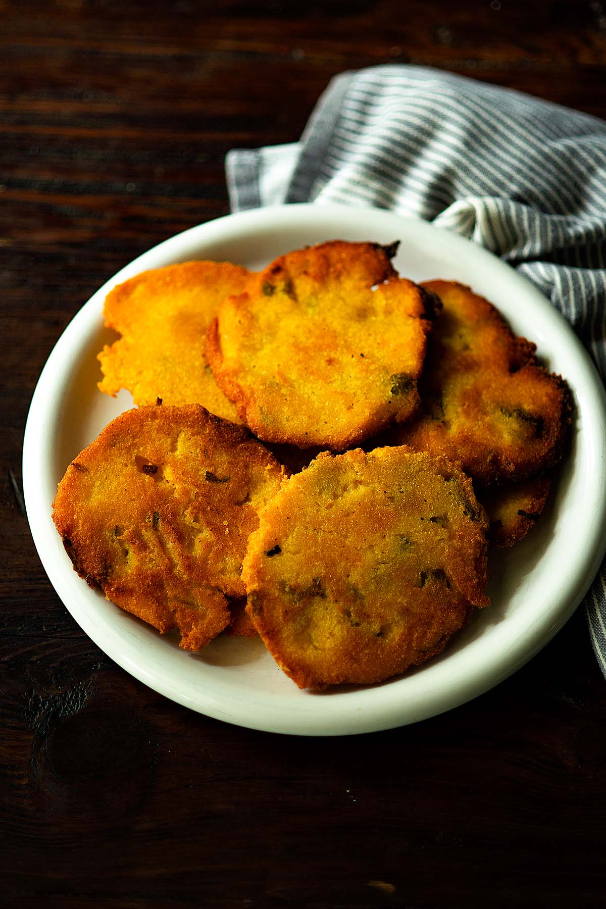 Hatch Green Chile Cheddar Hot Water Cornbread served family style on one plate.