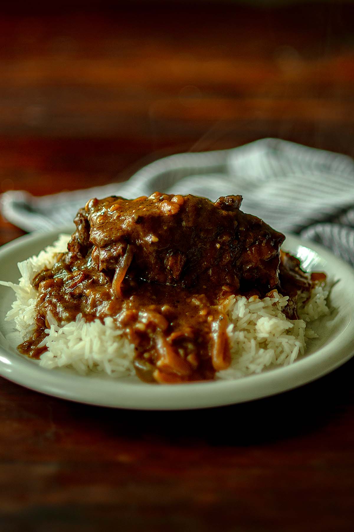 Smothered southern oxtails served over rice.