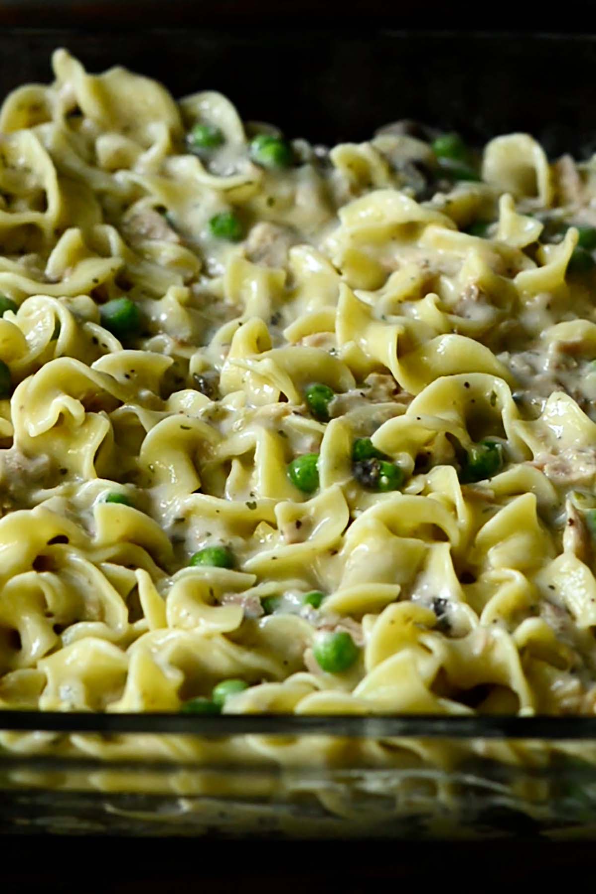 Unbaked tuna noodle casserole in a baking dish.