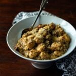 Pan fried Gnocchi in a creamy pesto sauce topped with freshly shredded parmesan cheese.