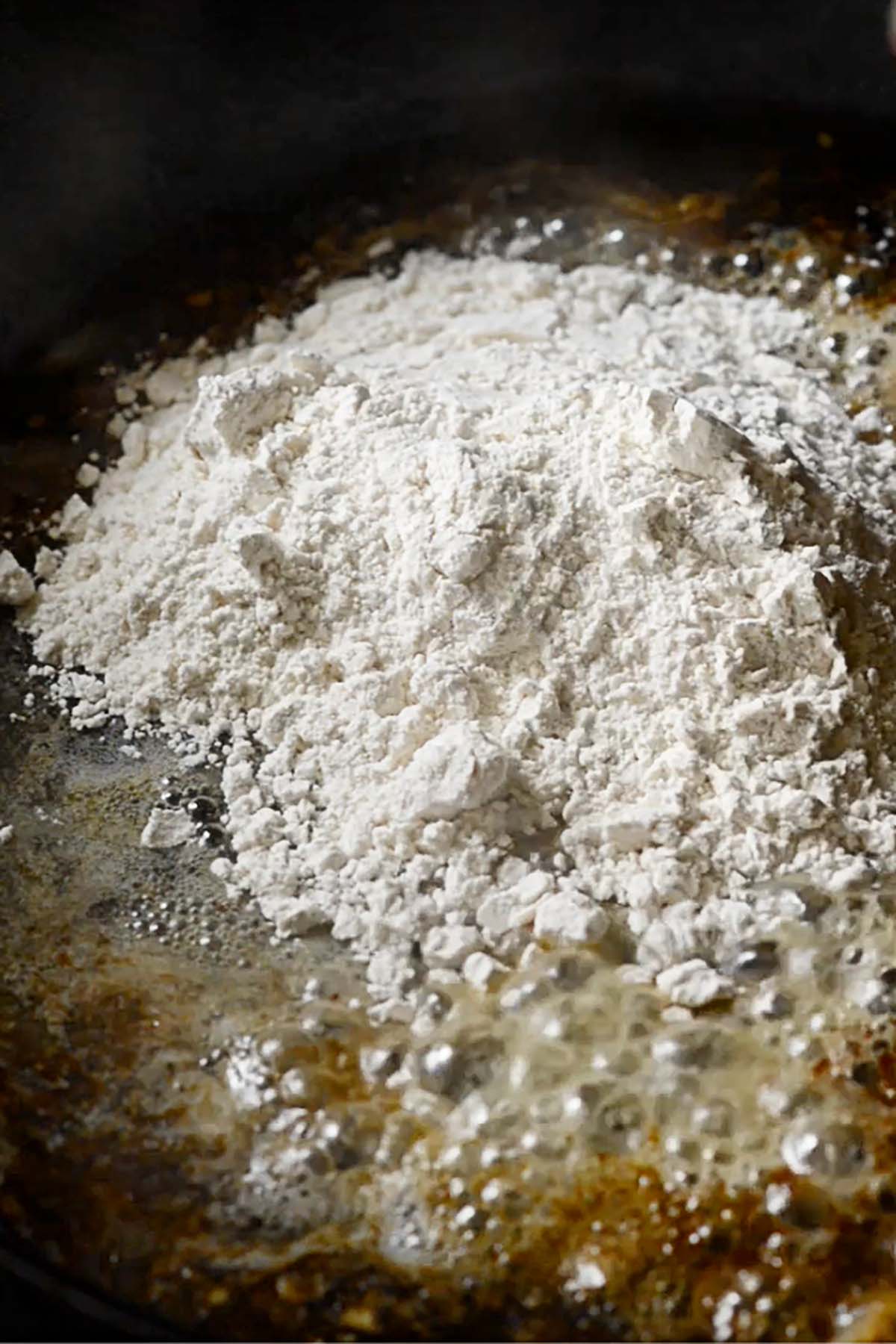 Four and butter in a cast iron skillet for a brown onion gravy.