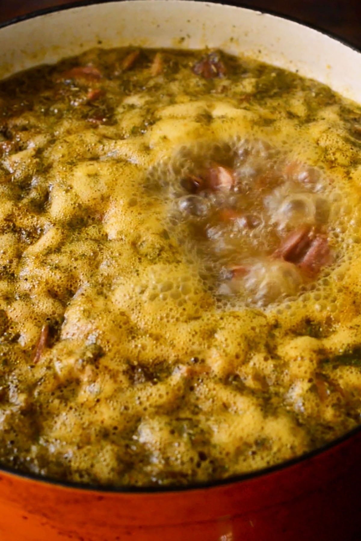 Red beans and rice simmering in a dutch oven.