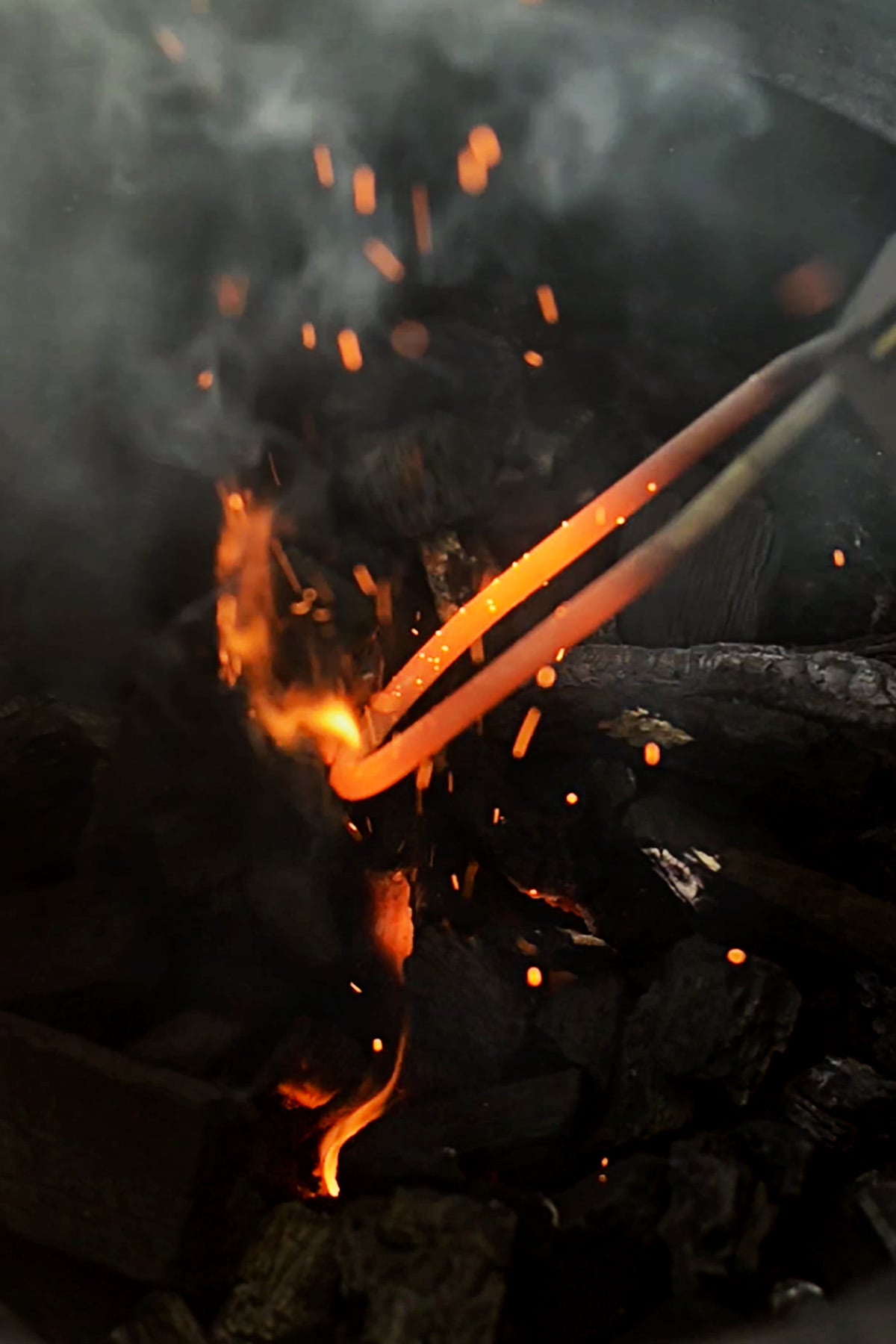 Lump charcoal being lit in a big green egg.