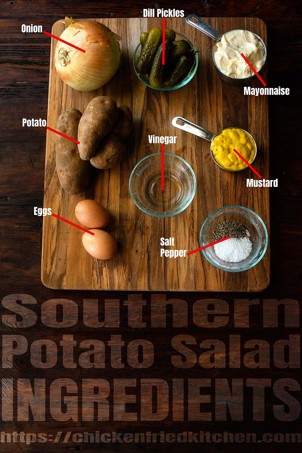 Classic Southern potato salad ingredients labeled and laid out on a wood table.