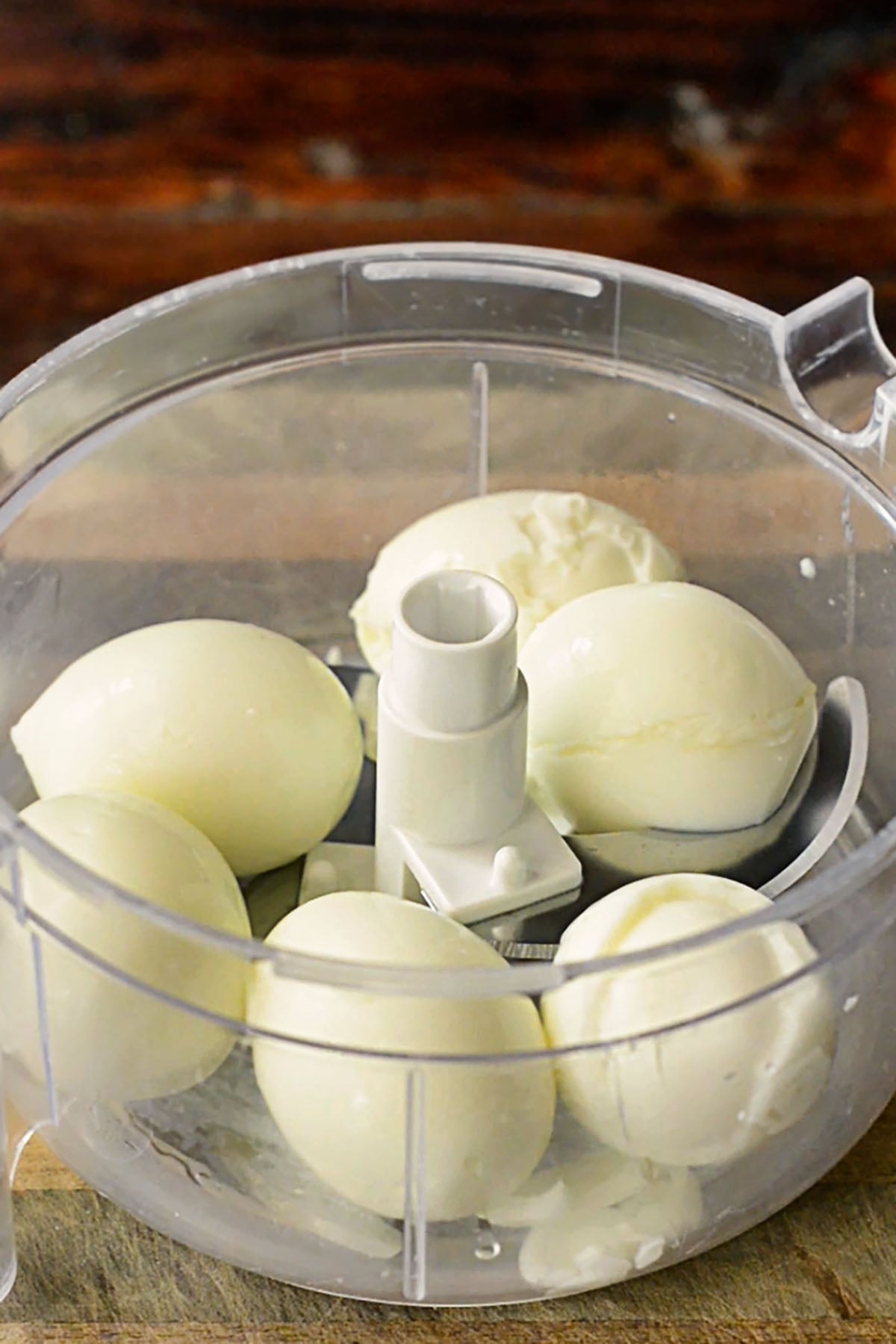 Hard boiled eggs in a handheld food processor.